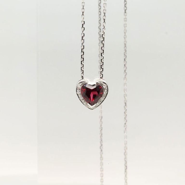 18k white gold tourmaline and diamond pendant on necklace