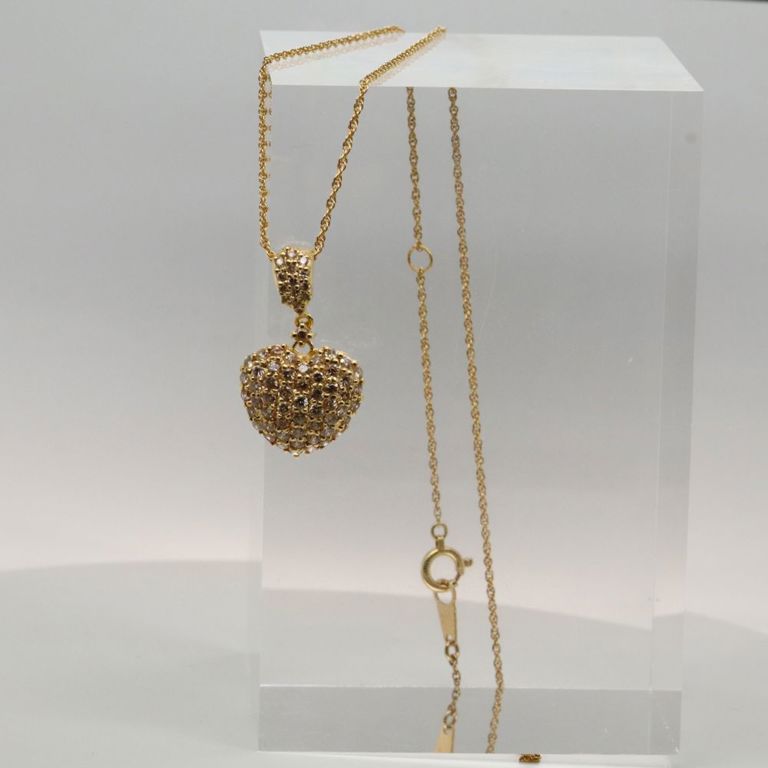 18k yellow gold diamond heart pendant on necklace