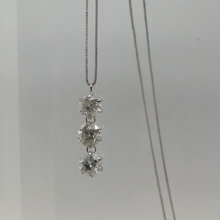 Platinim diamond pendant on necklace