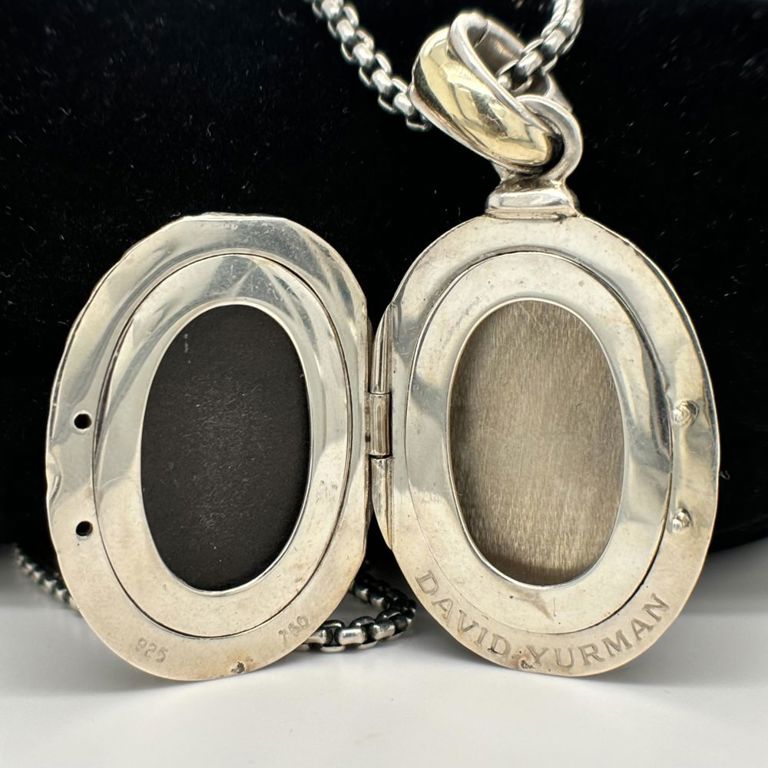 18k yellow gold and 925 sterling silver pendant on necklace