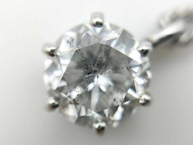 850 platinum diamond solitaire pendant on necklace