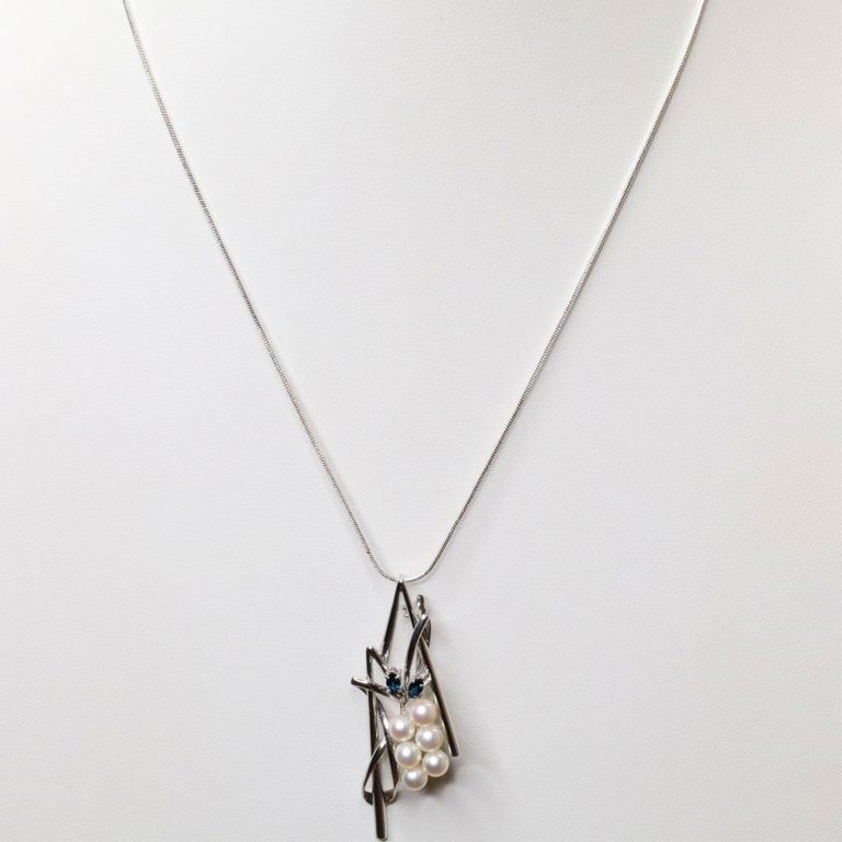 Sterling silver pearl and sapphire pendant on necklace