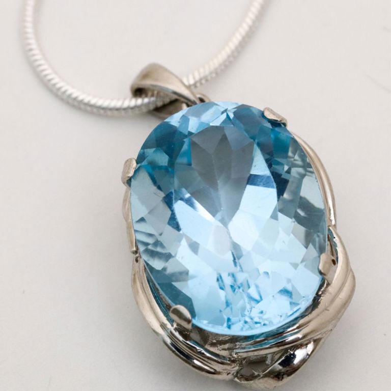 Platinum topaz pendant on sterling silver necklace