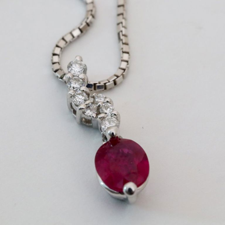 White gold necklace with platinum, ruby and diamonds pendant