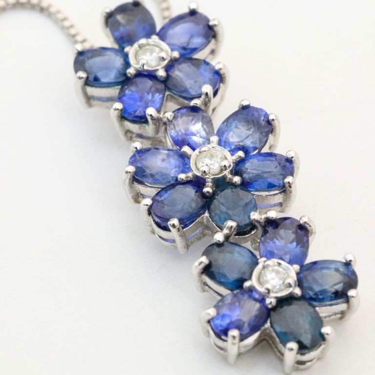 18k white gold sapphire and diamond pendant on necklace