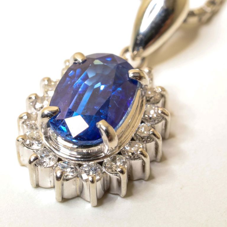 Platinum sapphire and diamonds pendant on necklace