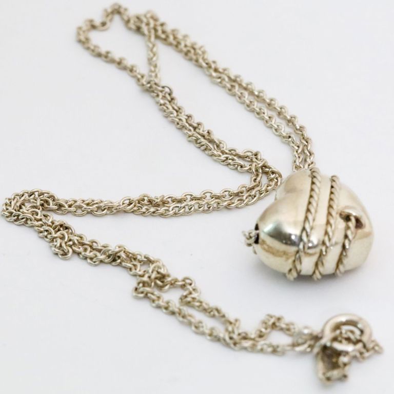 Sterling silver heart and arrow pendant on necklace