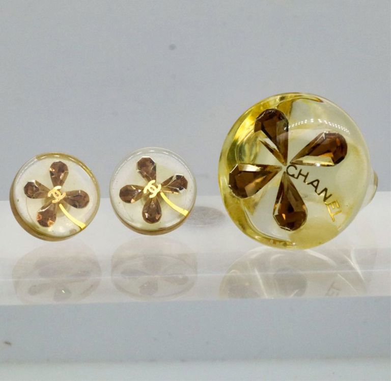 Chanel four-leaf clover ring and stud earrings