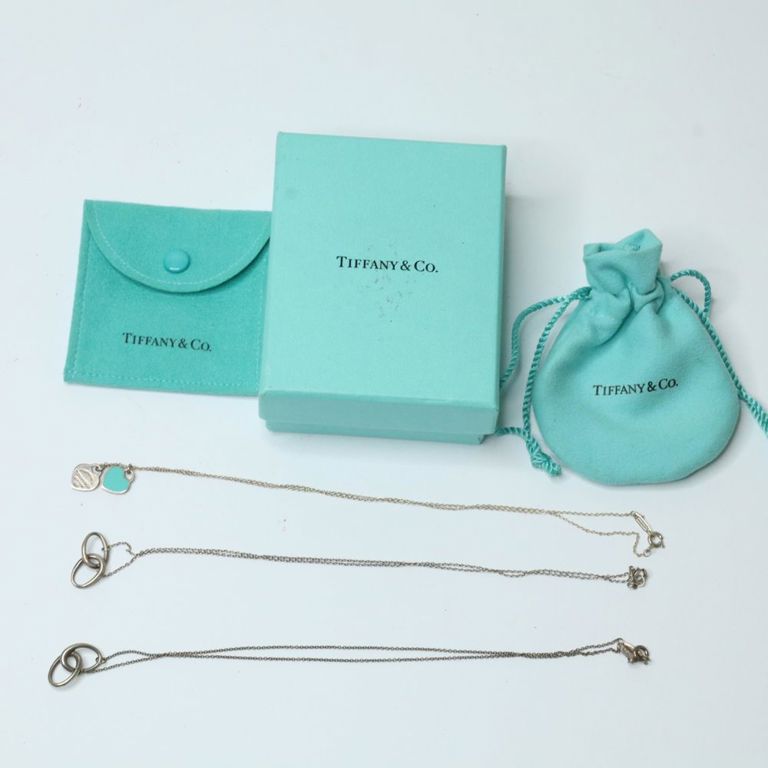 Three sterling silver pendant necklaces