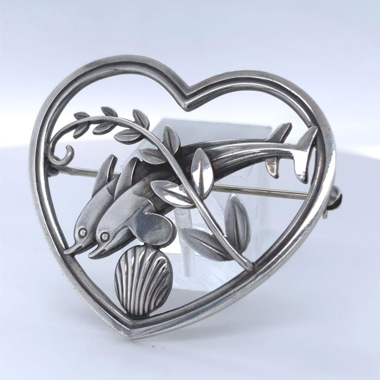 Sterling silver heart brooch with a dolphins motif