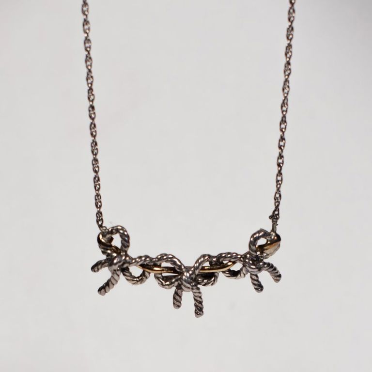 Yellow gold and sterling silver triple ribbon necklace