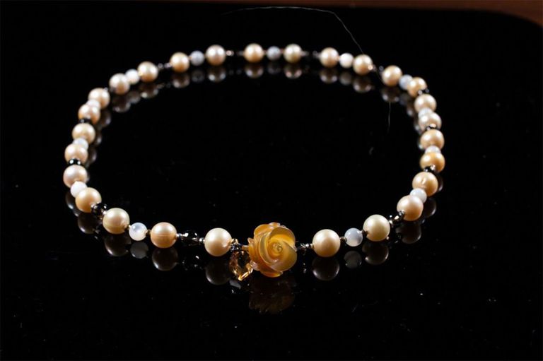 Sterling silver pearl necklace with flower pendant