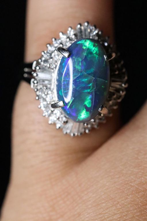 900 platinum black opal and diamond halo ring