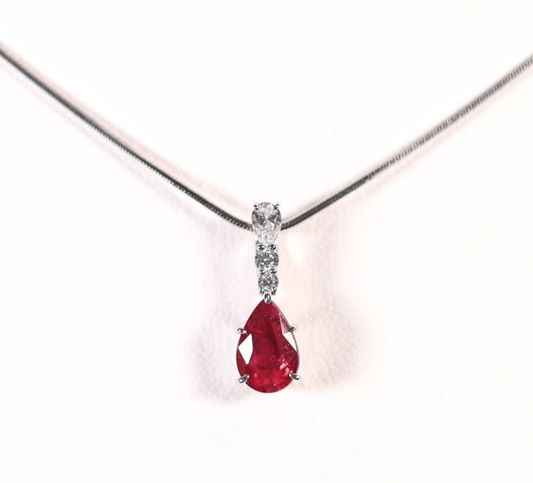 Platinum pendant with ruby and diamonds on chain