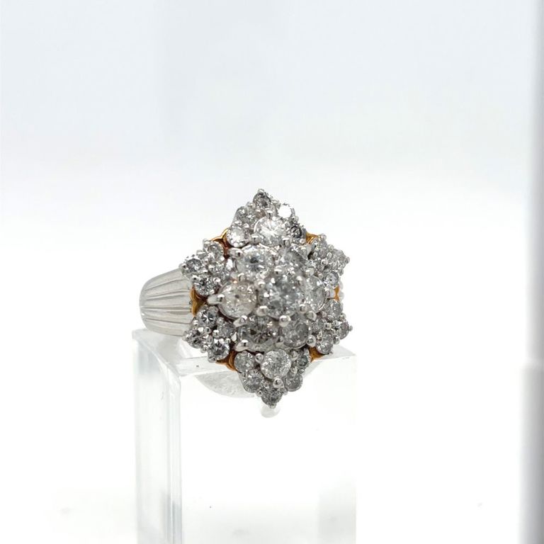 Platinum and yellow gold floral ring with diamonds