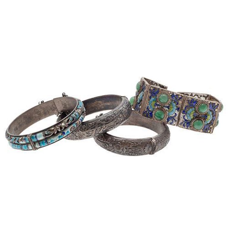 Collection of Chinese jade, enamel, and silver bracelets