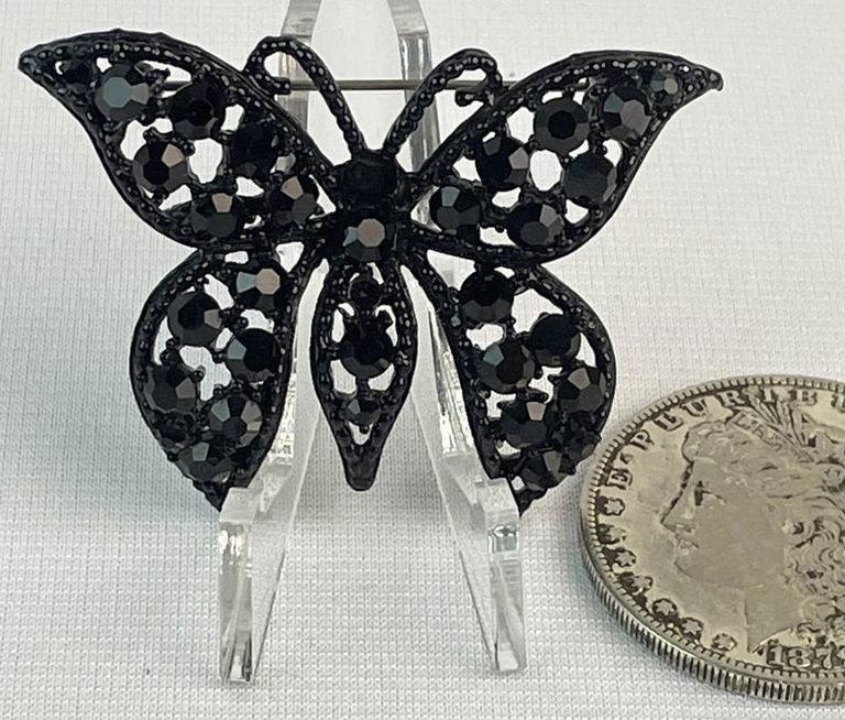 Vintage black japanned butterfly brooch