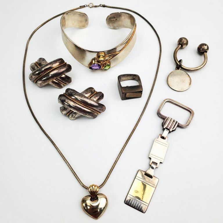 Five-piece lot of sterling silver jewelry items