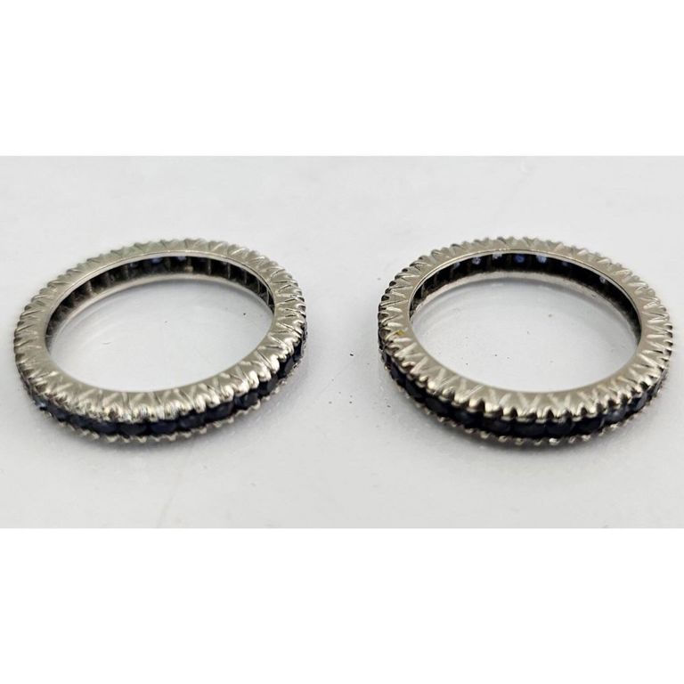 Pair of 14k white gold and sapphires eternity bands