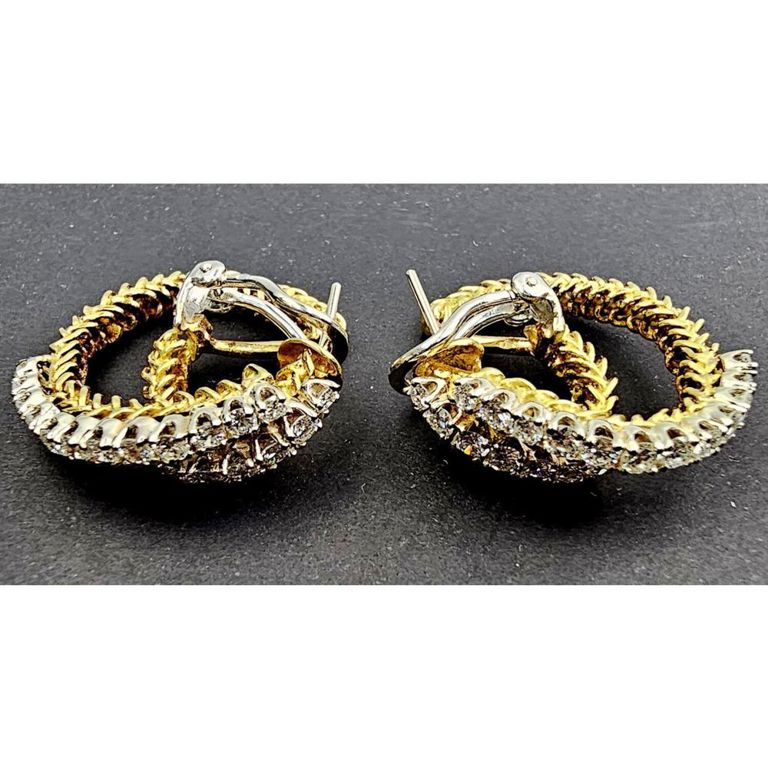 Fine pair of large 18k gold and diamond earrings