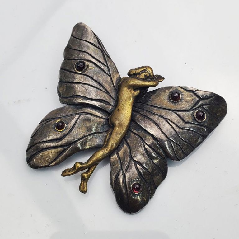 Art Nouveau sterling silver butterfly brooch with garnet