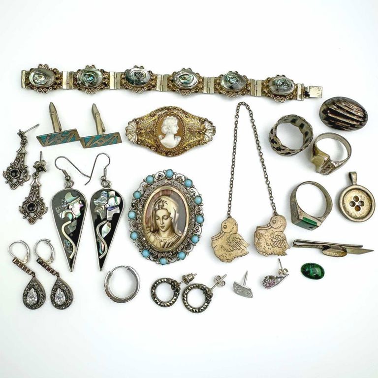 Group lot of silver jewelry with cameo style brooch