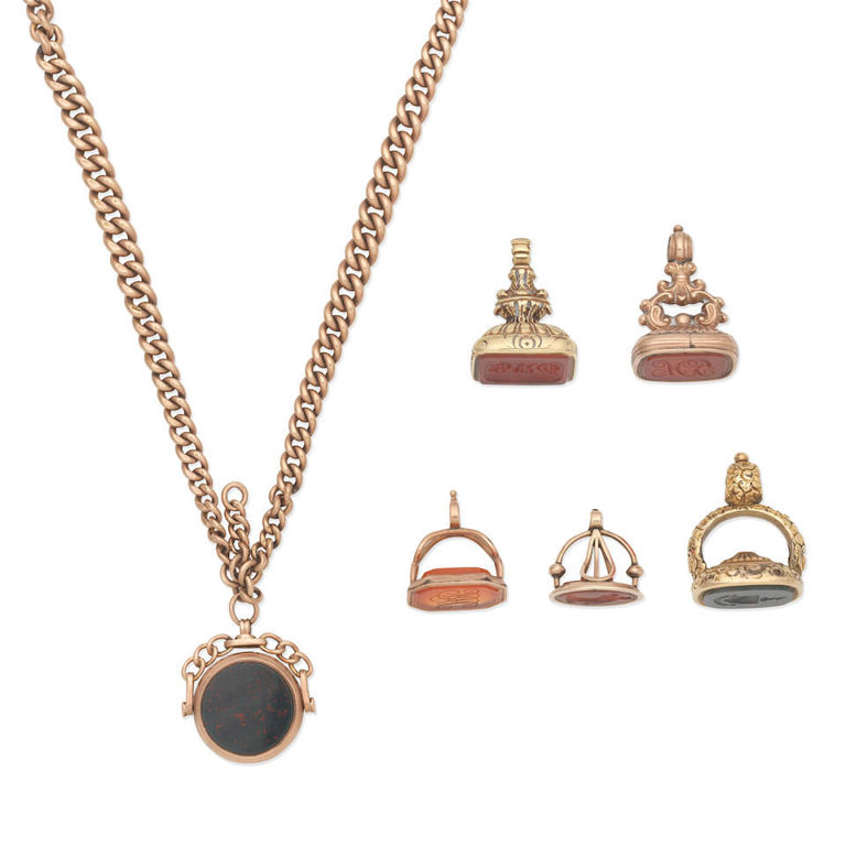 Fob seals and swivel fob pendant necklace