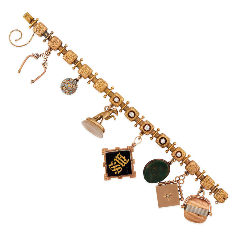 Gold bracelet with 7 gold charms