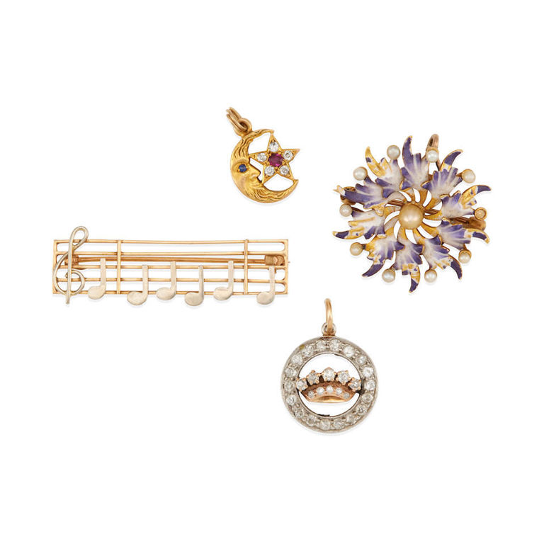 Group of gold and gem-set charms and brooches