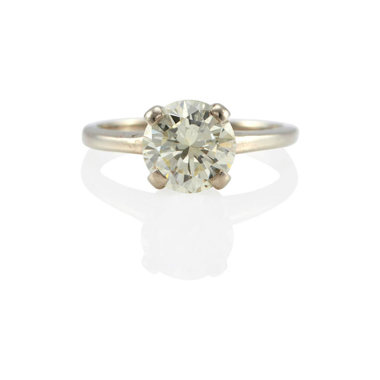 14k white gold and diamond solitaire ring
