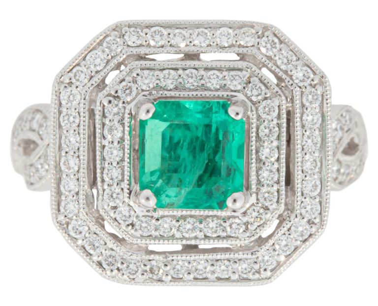 Platinum emerald and diamond ring