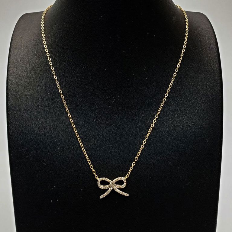 14k gold bow necklace with diamonds
