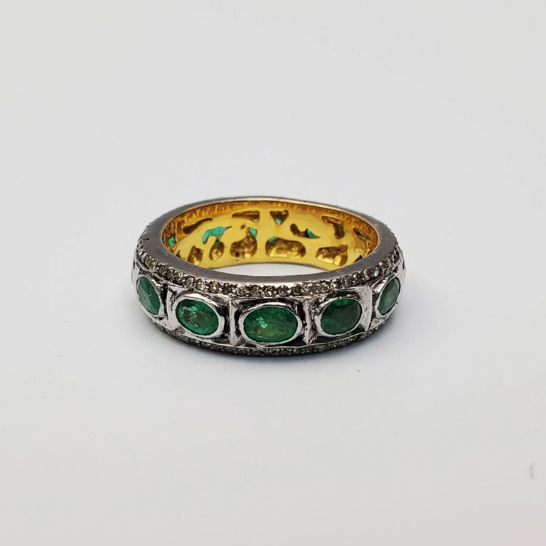 Gold, silver ring with diamonds and emeralds