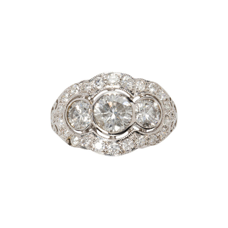A diamond and 18k white gold ring