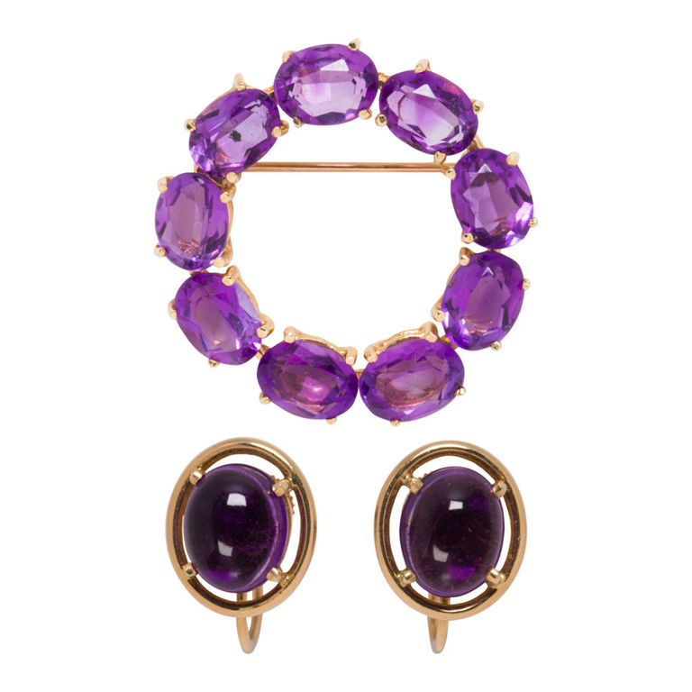 An amethyst and 14k gold brooch and earrings