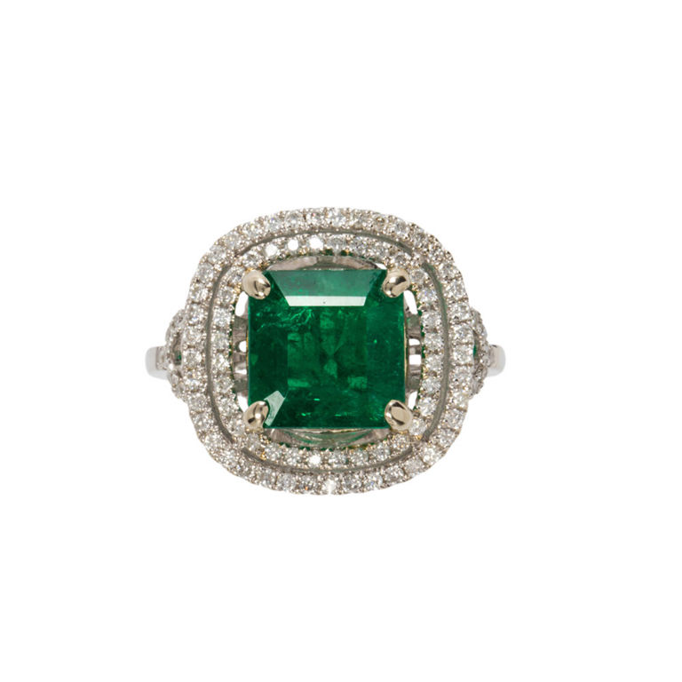 14k white gold ring with emerald and diamond