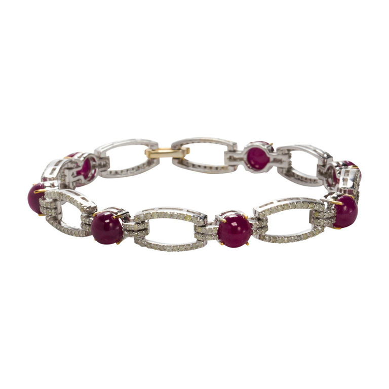 14k gold, silver, ruby, and diamond bracelet