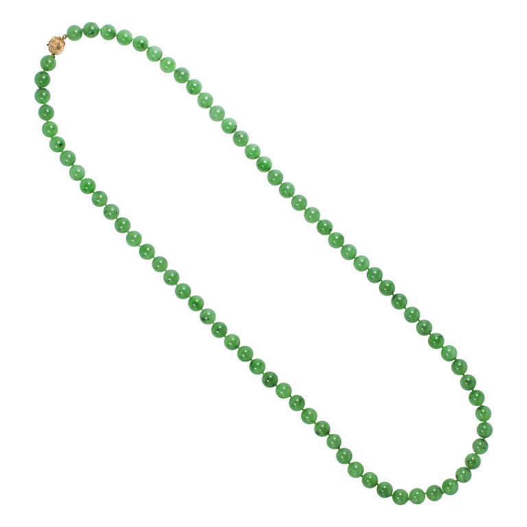 A Jade and 14k gold necklace