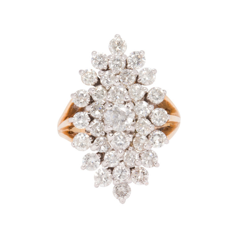 A diamond and 14k gold ring