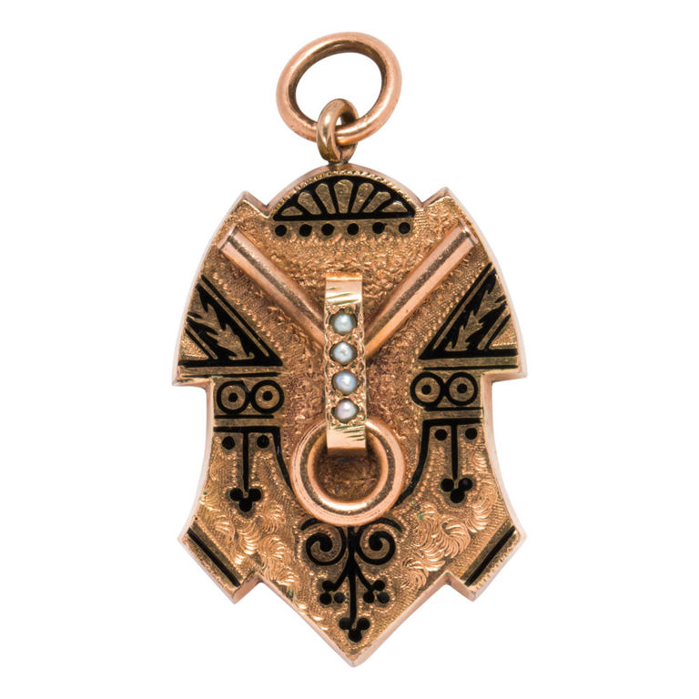 A Victorian black enamel and 14k gold mourning locket