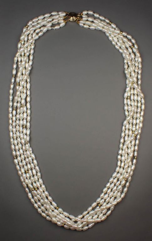 Multi strand pearl and 14k gold necklace