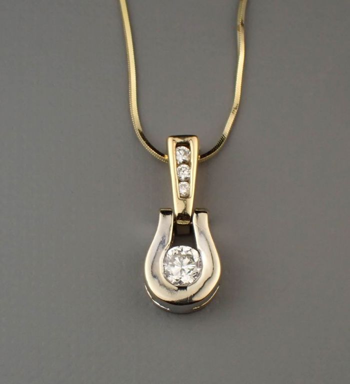 Diamond and 14k gold pendant necklace