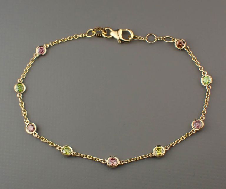 Fancy color diamond and 14k gold bracelet