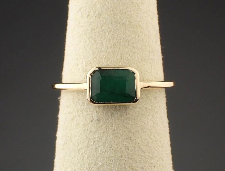 14k yellow gold ring with emerald