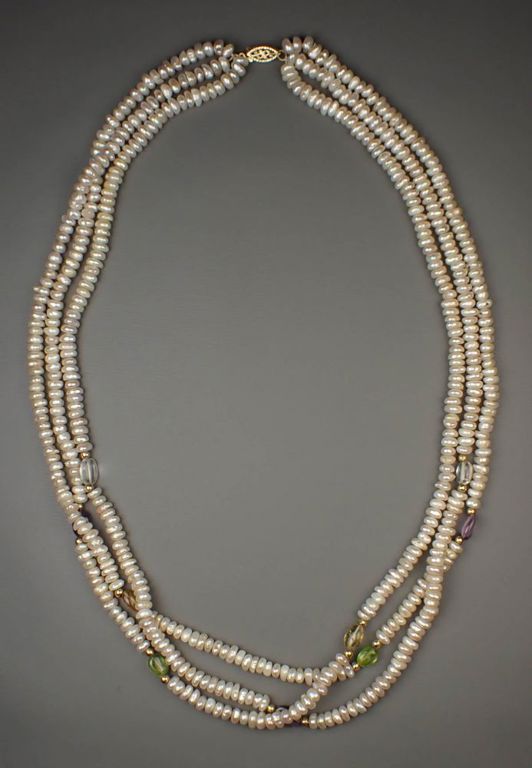 Triple strand pearl and gemstone necklace
