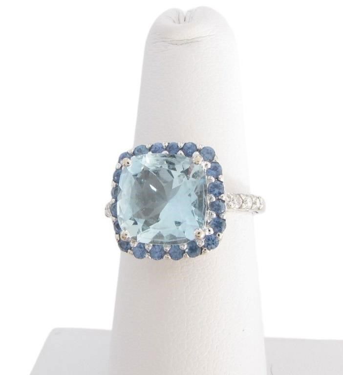 14k white gold blue topaz and diamond ring
