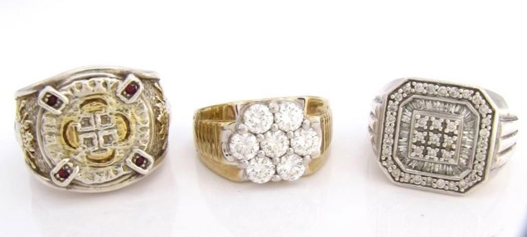 Three sterling silver gent's rings with cubic zirconia