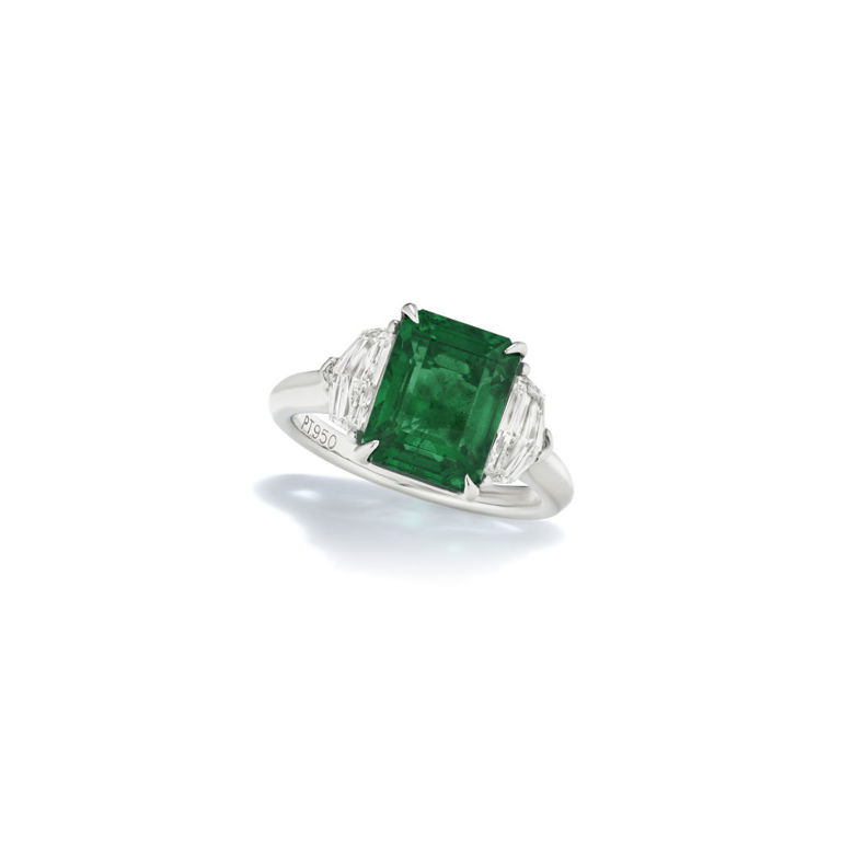 Platinum emerald and diamond ring