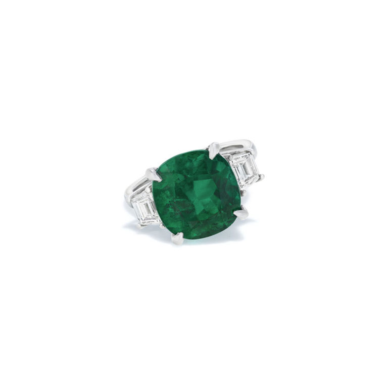 Platinum emerald and diamond ring