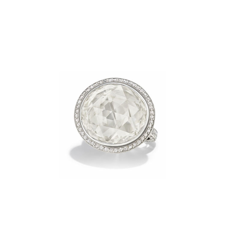Platinum diamond and emerald ring
